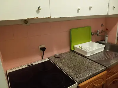 a kitchen with a sink and a counter top at Djordje in Belgrade