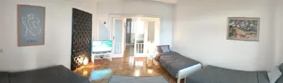 a living room with a couch and a television at Vuk 1 in Belgrade