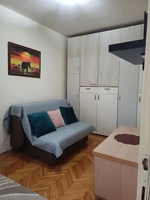 a living room with a couch and a table at Beautiful house in Smederevo