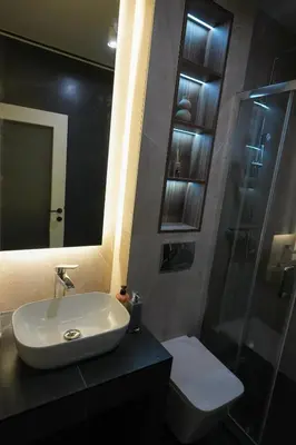 a bathroom with a sink and a shower at Stan na dan Bulevar in Belgrade