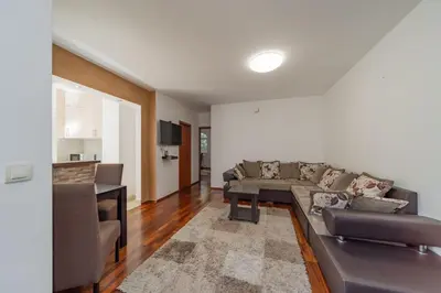 a living room with a couch and a table at Apartman Igor 1 in Belgrade