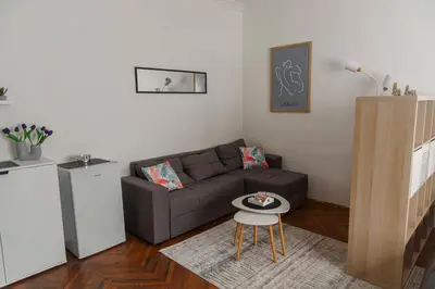 a living room with a couch and a table at Obilicev venac DM in Belgrade