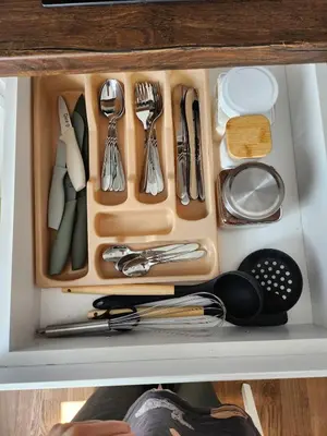 a drawer filled with utensils on a shelf at Apartment Endorfin - Modern apartment close to airport in Surčin