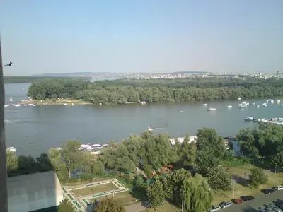 a view of a river with boats in it at Belgrade Serbia apartment in Belgrade