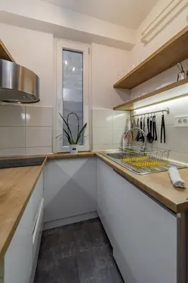 a kitchen with a counter and a sink at Charming One Bedroom In The Heart of Belgrade in Belgrade