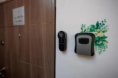 a door with a towel dispenser on the wall at Cozy Little Place - Parking Available in Belgrade