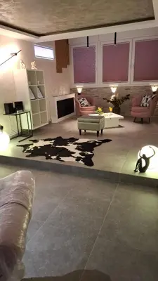 a living room with a couch and a table at LUX Casa di Stefan in Belgrade