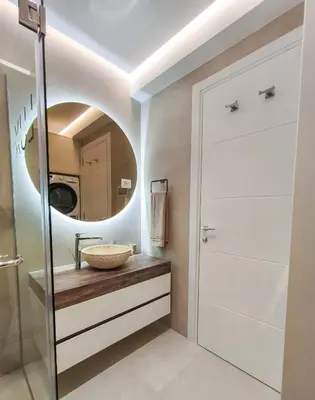 a bathroom with a sink and a mirror at Lux Brilijant Apartmant in Belgrade