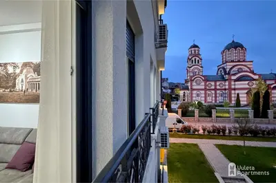 a view of a building from a balcony at Vuleta Apartments Aranđelovac in Arandjelovac