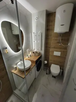 a bathroom with a sink and a toilet at Park Residence Apartman 1, Mirijevo, Beograd in Belgrade
