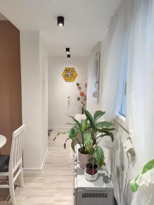 a room with a table with potted plants on it at KS Studio 2 in Belgrade