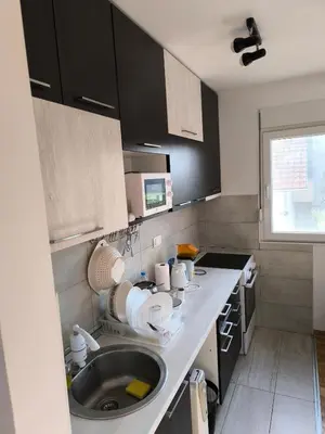 a kitchen with a sink and a counter top at Apartment for a day, Zemun, Altina, two rooms in Belgrade