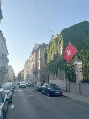 a street with cars parked on the side of the road at Design Suite in Prime Location Superstring Home in Belgrade