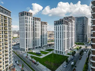 an aerial view of tall buildings in a city at Queen's Park Residence Apartments in Belgrade