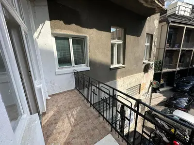 an empty balcony of a house with a fence at Eight Apartment in Belgrade