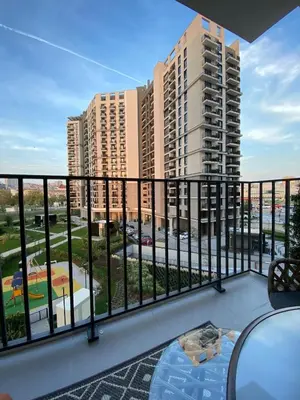 a balcony with a view of a building at Belgrade Waterfont, Symphony 1, Studio 307 in Belgrade