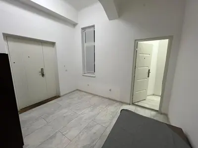 an empty room with a mirror and a door at Pablo MovieSTAR in Belgrade