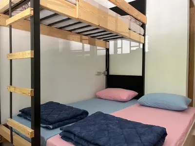 two bunk beds in a small room with at Chillton hostel in Belgrade