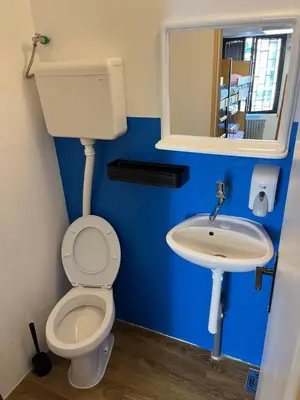 a bathroom with a toilet and a sink at Chillton hostel in Belgrade