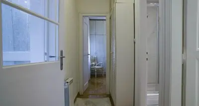 a bathroom with a walk in shower and a mirror at Apartment in city center of Belgrade in Belgrade