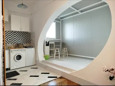 a kitchen with a washer and dryer in a room at on top of the city in Belgrade