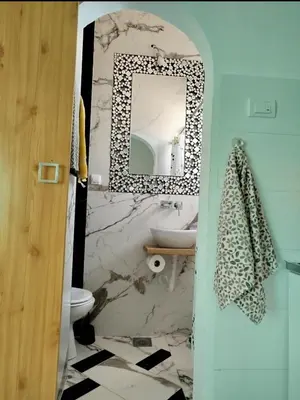 a bathroom with a sink and a mirror at on top of the city in Belgrade