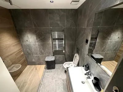 a bathroom with a sink and a toilet at River Sight Studio - BW SIMPHONY in Belgrade