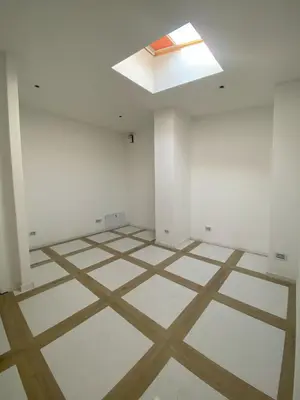 an empty room with a skylight on the ceiling at ast13r 12451f in Belgrade