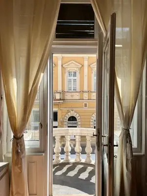 an open door with a view of a building at Apartment Ksenija in Belgrade
