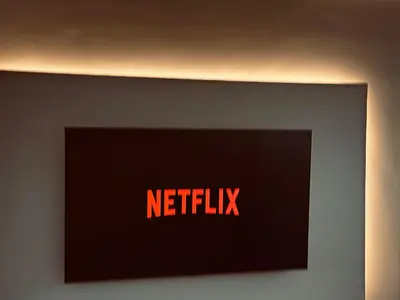 a sign with the word netflix on a wall at Silent hill apartment in Belgrade