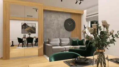 a living room with a couch and a table at Apartman MINA in Kalugjerica