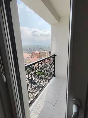 a balcony with a view of a city at Apartman MINA in Kalugjerica