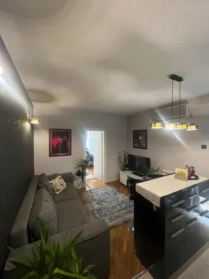 a living room with a couch and a table at Joker 5 in Belgrade