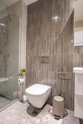 a bathroom with a toilet and a shower at BW Lux apartments Beograd na vodi in Belgrade