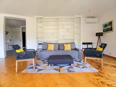 a living room with a couch and two chairs at Kalemegdan in Belgrade