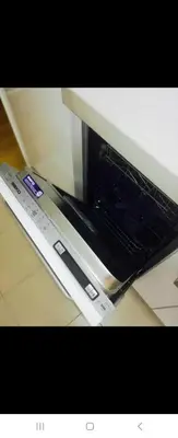 an oven door is open on a stove at Belvile one bedroom apartment in Belgrade