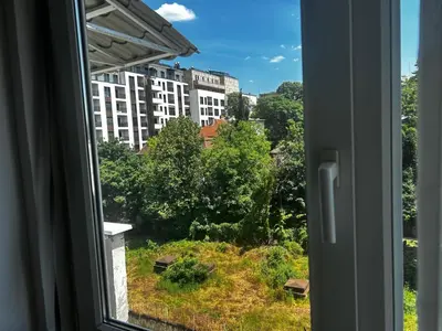 a window with a view of a city at Apartman Play in Belgrade