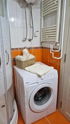 a washing machine with two baskets on top of it at Apartman Pegaz in Lazarevac