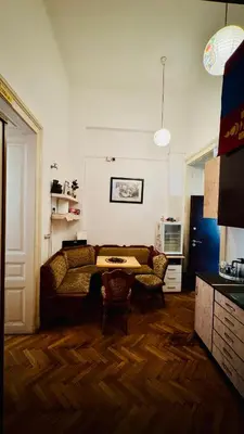 a living room with a couch and a table at BW Hostel in Belgrade
