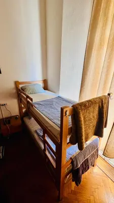 a bedroom with two bunk beds in a room at BW Hostel in Belgrade