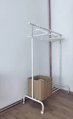 a metal cart with a box in a room at Boneca apartment in Belgrade