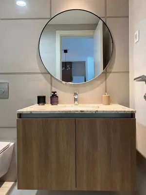 a bathroom with a sink and a mirror at Waterfront Nights in Belgrade