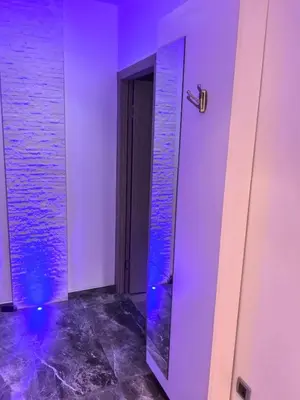 a bathroom with a mirror with blue lights at Kalemegdan park & Zoo - City center in Belgrade