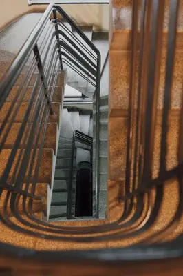an overhead view of a stairway in a building at Radio Belgrade Apartment in Belgrade