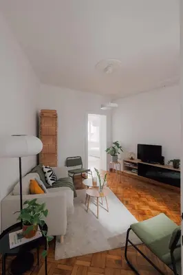 a living room with a couch and a table at Radio Belgrade Apartment in Belgrade