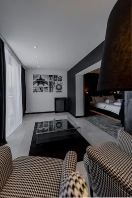 a living room with a couch and a bed at Rei 2 in Belgrade