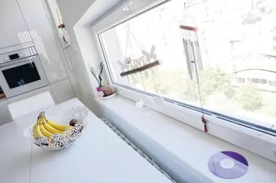 a bowl of bananas sitting on a counter next to a window at 3BD Luxury Apartment in New Belgrade whit parking in Novi Beograd