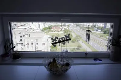 a bowl of bananas sitting on a window sill at 3BD Luxury Apartment in New Belgrade whit parking in Novi Beograd