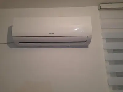 a television on a wall in a room at Belgrade Center Lux in Belgrade