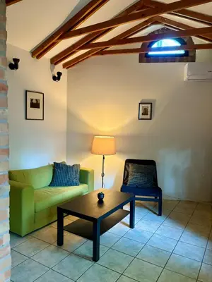 a living room with a couch and a coffee table at Tiny Home L&B in Belgrade